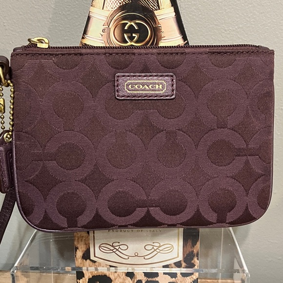 Coach Handbags - Coach Dark Plum Signature Wristlet
